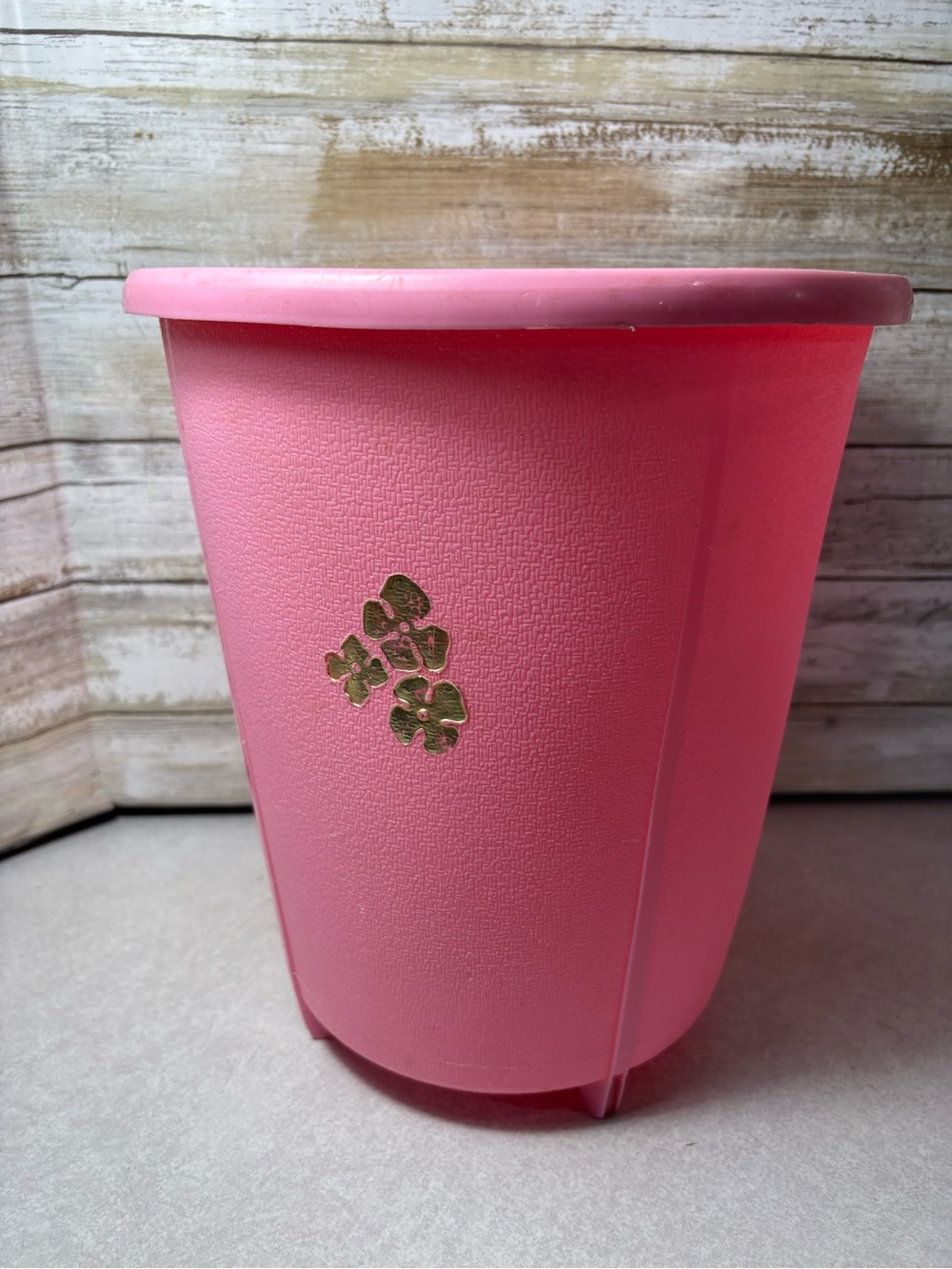 Vintage pink Rubbermaid garbage can
